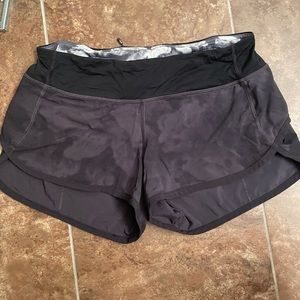 Black/canon design lululemon shorts